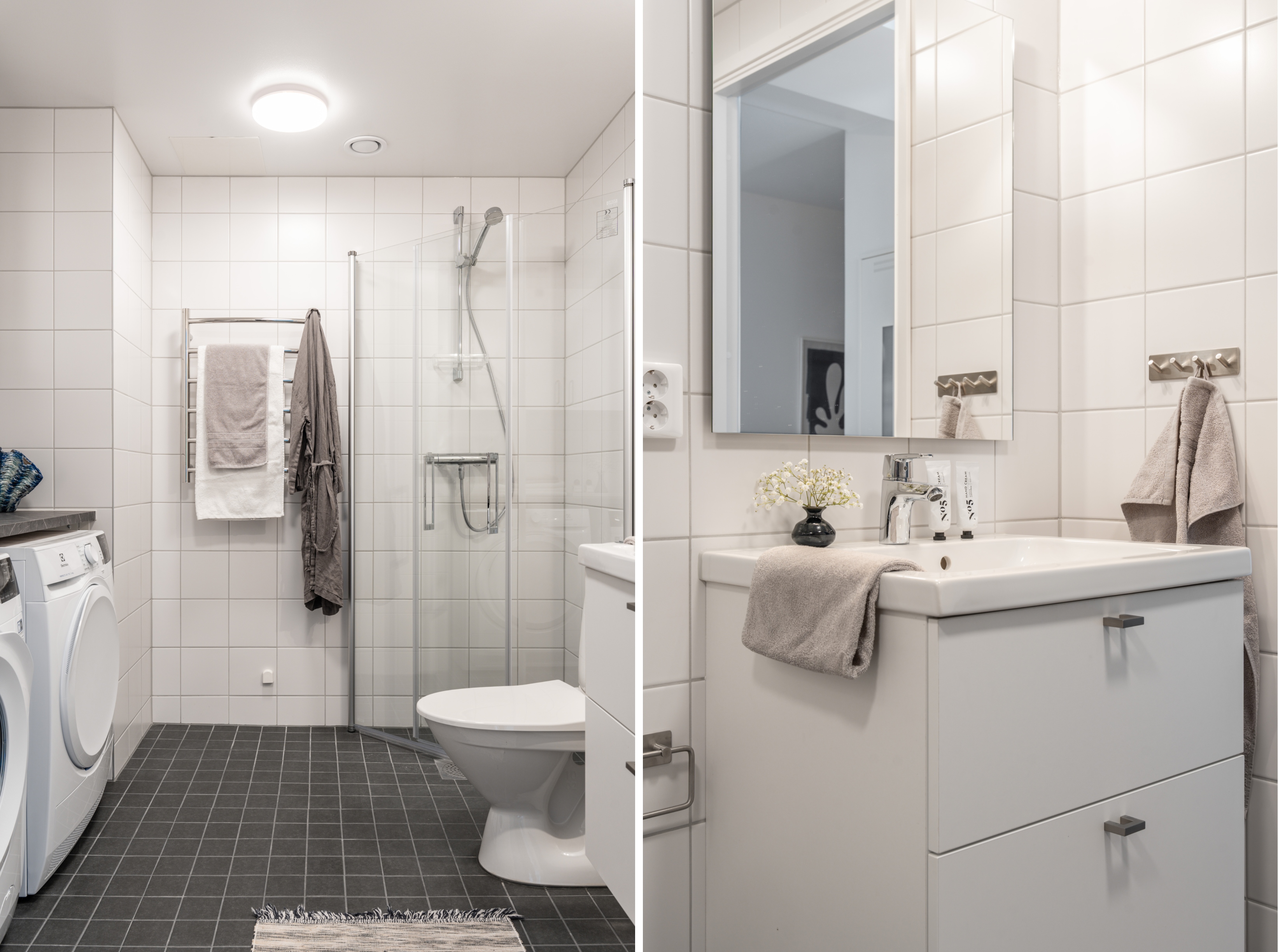 Badrum med tvättmaskin och torktumlare